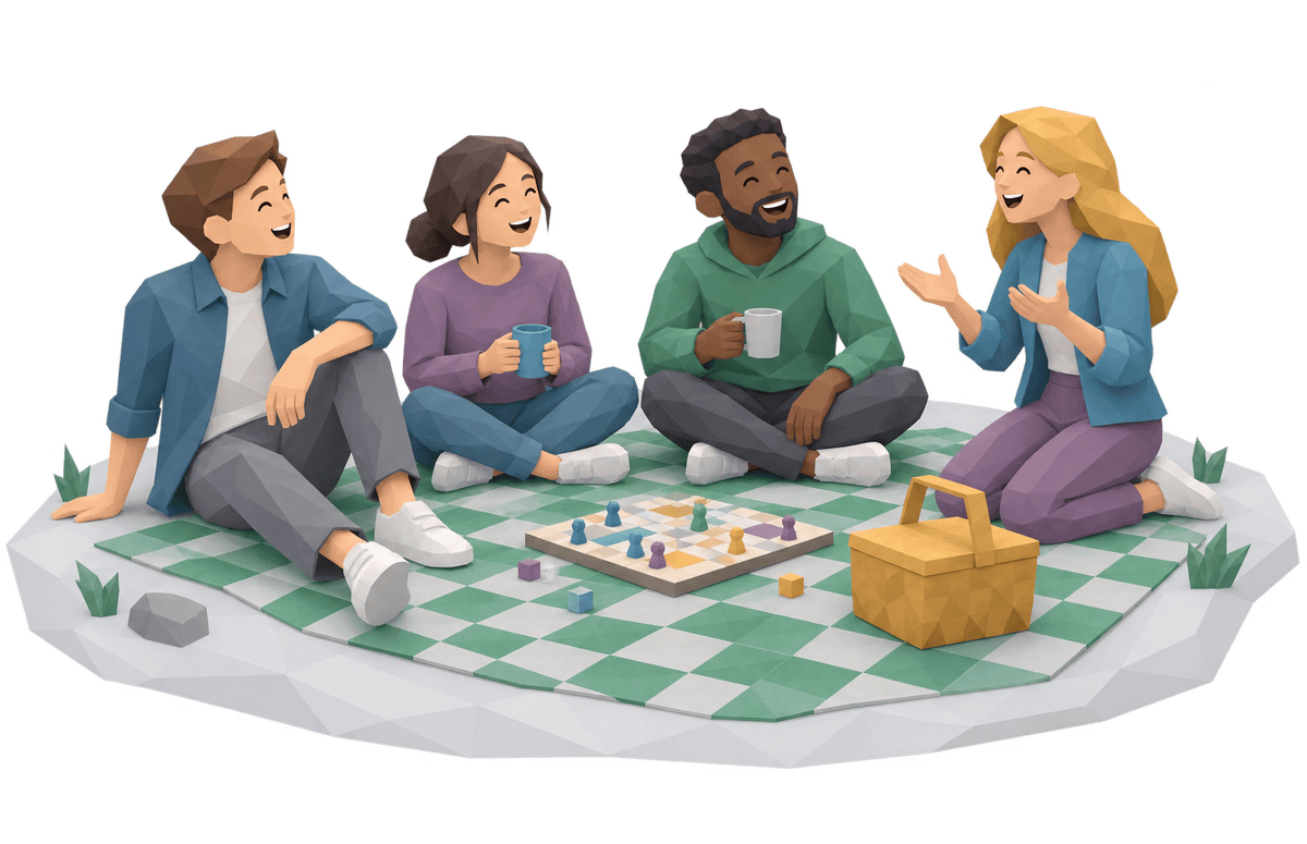 Four friends on a picnic blanket laughing over a board game.